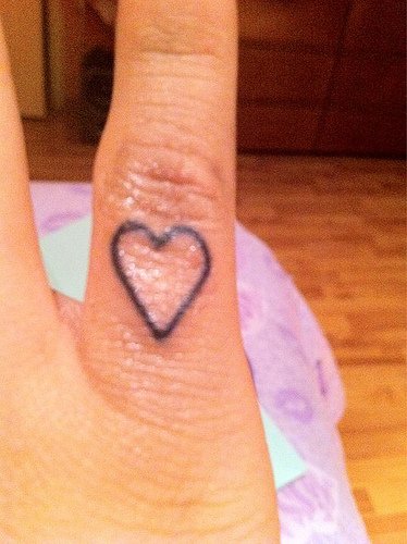 Miley Cyrus Heart Finger Tattoo