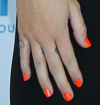 Miley Cyrus Finger Tattoos