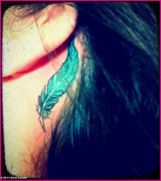 Demi Lovato Feather Tattoo Behind Her Ear