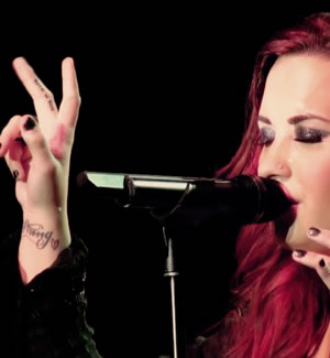 Demi Lovato’s Rock and Roll Tattoo on Her Finger