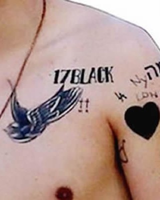 Harry Styles’ “17 Black” and 2 Small Crosses Chest Tattoos