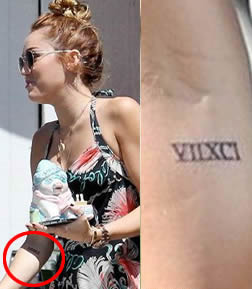 Miley Cyrus Roman Numeral Arm Tattoo