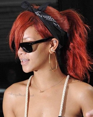 Rihanna Shows Off Tattoos and Red Hair in a Sexy Black Dress