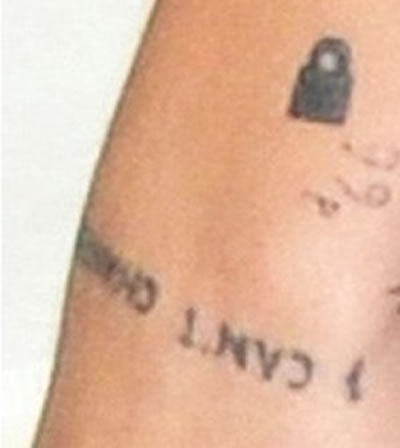 Harry Styles’ “I Can’t Change” Tattoo