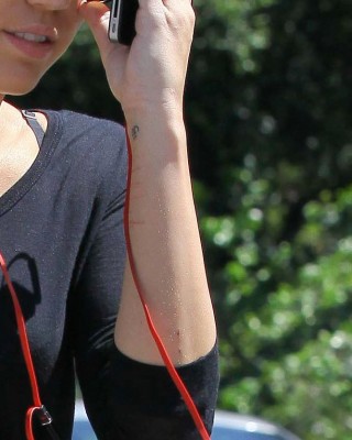 Pictures of Miley Cyrus New Tattoo Show Signs of Self-Harming?