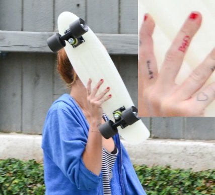 Miley Cyrus’ BAD Finger Tattoo
