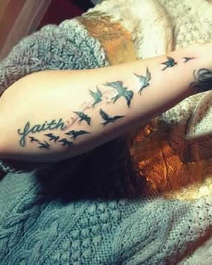 Demi Lovato's String of Birds Tattoo on Her Arm