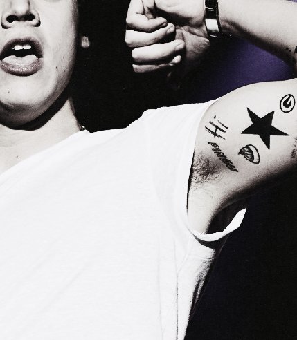Harry Styles Bicep Tattoos