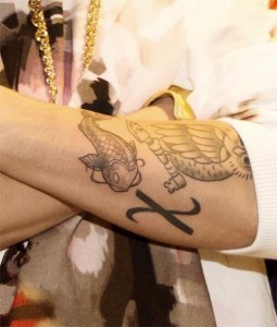 Justin Bieber X and Koi Tattoos