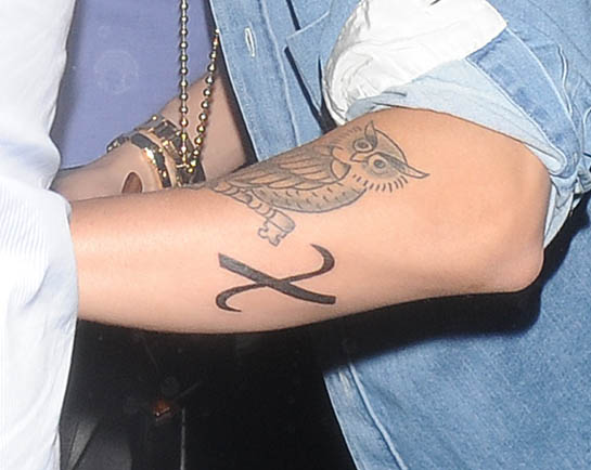 Justin Bieber’s “X” Greek Christ Symbol Tattoo on His Arm