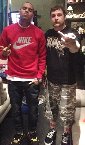Chris Brown and Tattoo Artist Usual Pose