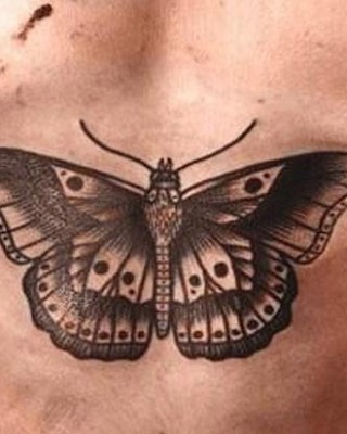 Harry Styles’ Oddly Large Butterfly Chest Tattoo