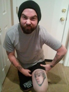 Angry Guy with Justin Bieber Tattoo