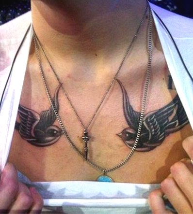 Harry Styles’ Swallow Tattoos & Covered-up Love Banner on His Chest