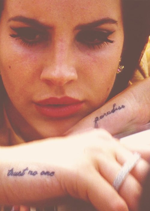 Adele Reveals Controversial “Paradise” Hand Tattoo- PopStarTats
