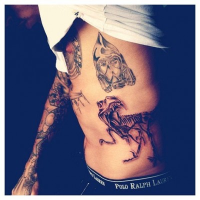 Chris Brown Dinosaur Tattoo