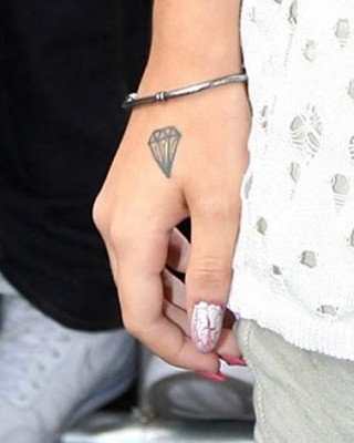 Cher Lloyd’s Diamond Hand Tattoo