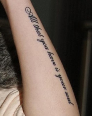 Lyrics Tattoos on Cher Lloyd’s Arms