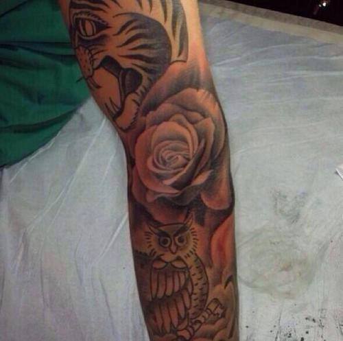 justin-bieber-rose-sleeve-tattoo
