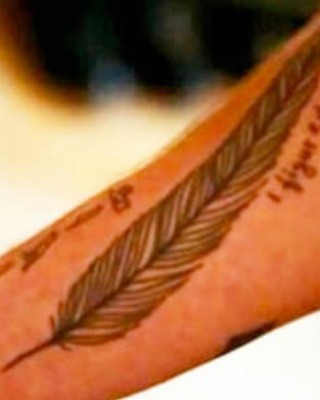 Liam Payne Shows Off Sweet “I Figured it Out” Tat on His Arm