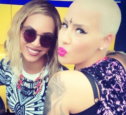 What is Amber Rose Thinking with Her New Inverted Cross Forehead Tat?