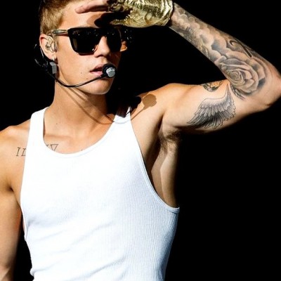 Justin Bieber Finally Reveals Mysterious Arm Tattoo…And it’s an Angel’s Wing!