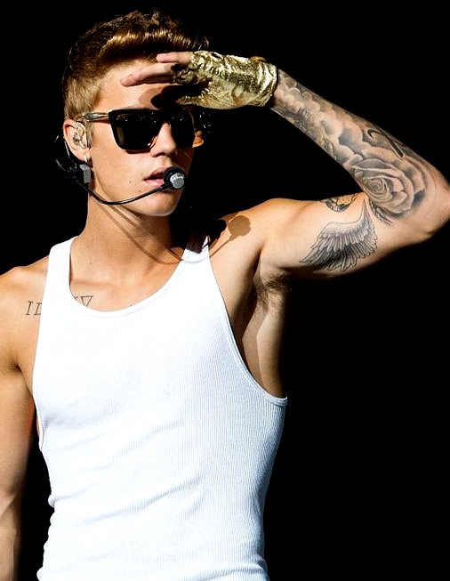 Justin Bieber Finally Reveals Mysterious Arm Tattoo…And it’s an Angel’s Wing!