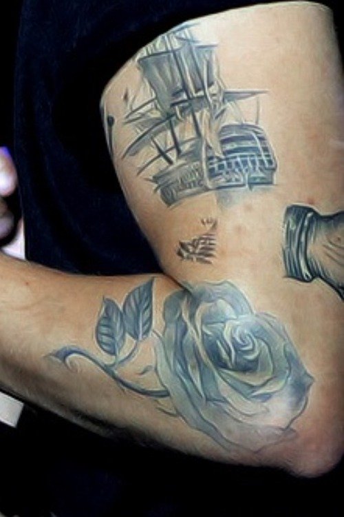 Harry Styles’ New Zealand Fern Tattoo on His Arm