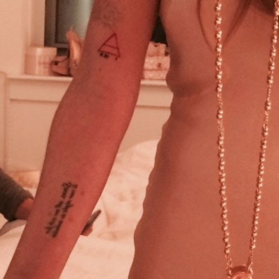Lindsay Lohan Explains Spiritual Meaning Behind Altered Triangle Tattoo