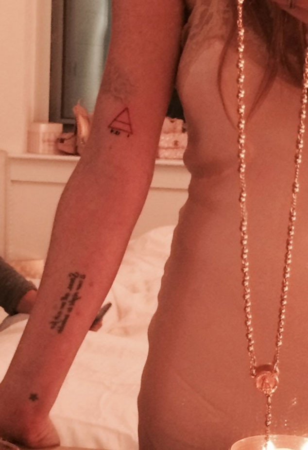 Lindsay Lohan Explains Spiritual Meaning Behind Altered Triangle Tattoo