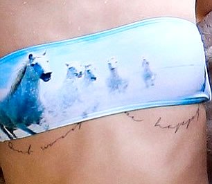 cara-delevingne-dont-worry-be-happy-tattoo