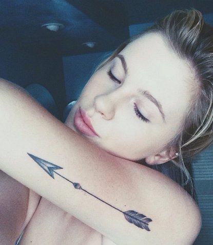 Model Ireland Baldwin Gets Cool Arrow and Lotus Flower Tattoos