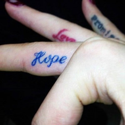 Rita Ora’s Blue “Hope” Finger Tattoo