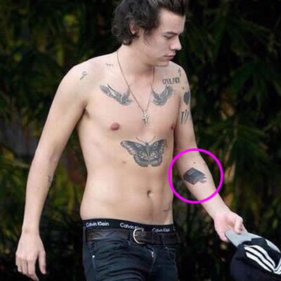 Harry Gets “Silver Spoon” Arm Tattoo and Covers Up “Things I Can’t” Tat With Bible Image