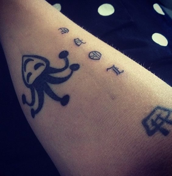 Justin Bieber Unveils “Love” Arm Tattoo Amid Rumors of a Reunion With Selena Gomez