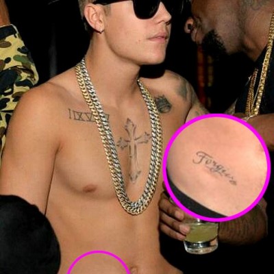 Shirtless Justin Bieber Shows Off New “Forgive” Hip Tattoo at Diddy Party