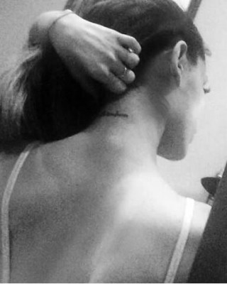 Ariana Grande Shows Off Sweet New “Mille Tendresse” Neck Tattoo
