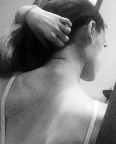 Ariana Grande Shows Off Sweet New “Mille Tendresse” Neck Tattoo