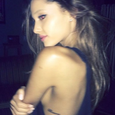 Ariana Grande Gets “Bellissima” Side Tattoo as Tribute to Grandfather