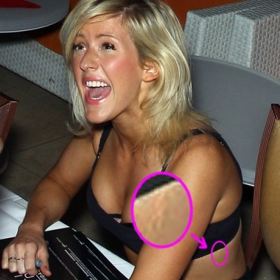 Ellie Goulding’s Mysterious “J” Tattoo on Her Side