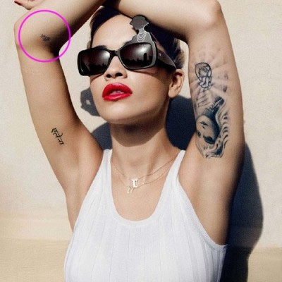 Rita Ora’s Purple Arm Tattoo of Brother’s Name