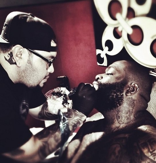 Rick Ross Just Got a “Rich Forever” Tattoo on His Chin…