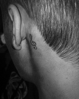 Justin Bieber Shows Off Simple Music Treble Clef Tattoo Behind His Ear