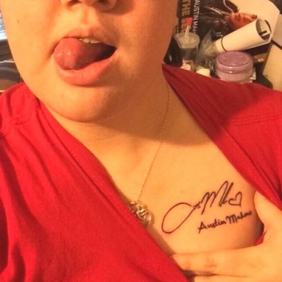 Superfan Gets Austin Mahone Signature Tattoo on Her Chest