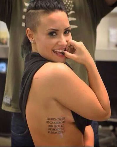 Demi Lovato Honors Family Members With Roman Numeral Birthdays Tattoo- PopStarTats