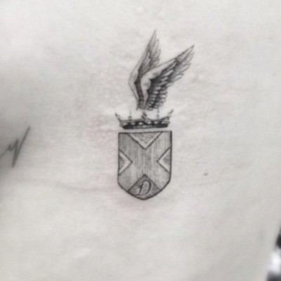 Cara Delevingne’s New Side Tattoo is a Winged Coat of Arms!