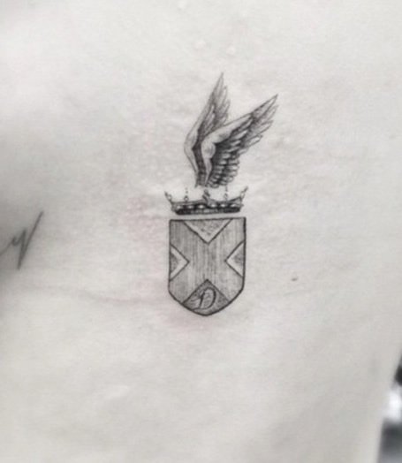 Cara Delevingne’s New Side Tattoo is a Winged Coat of Arms!