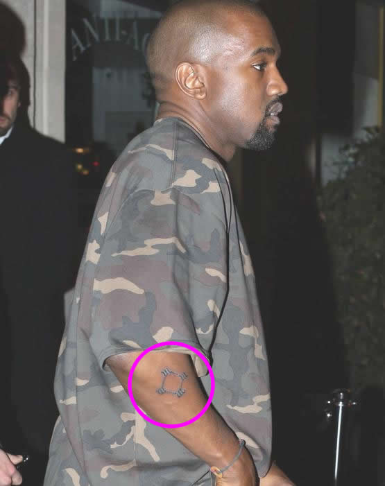 Kanye West Reveals New “So Help Me God” Virgin Mary Tattoo on His Arm