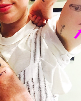 Miley Cyrus Shows Off New “BIEWTY” Arm Tattoo on Instagram