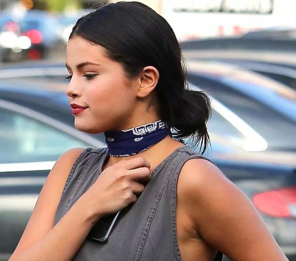 Selena Gomez Shows Off New Behind-the-Ear Neck “g”  Tattoo in L.A.